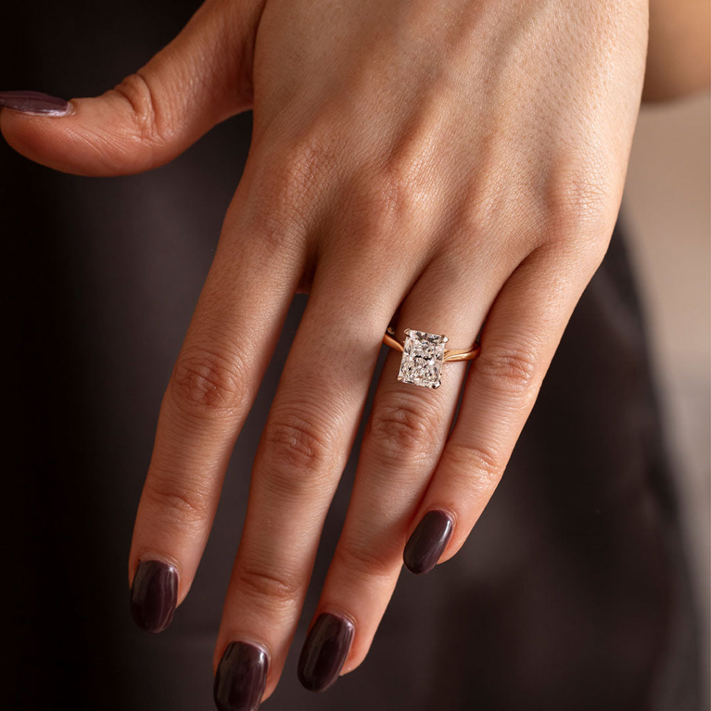 Radiant cut solitaire engagement ring